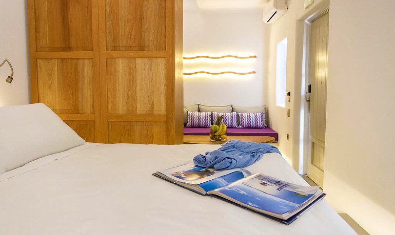 La Perla Villas & Suites honeymoon villa bedroom