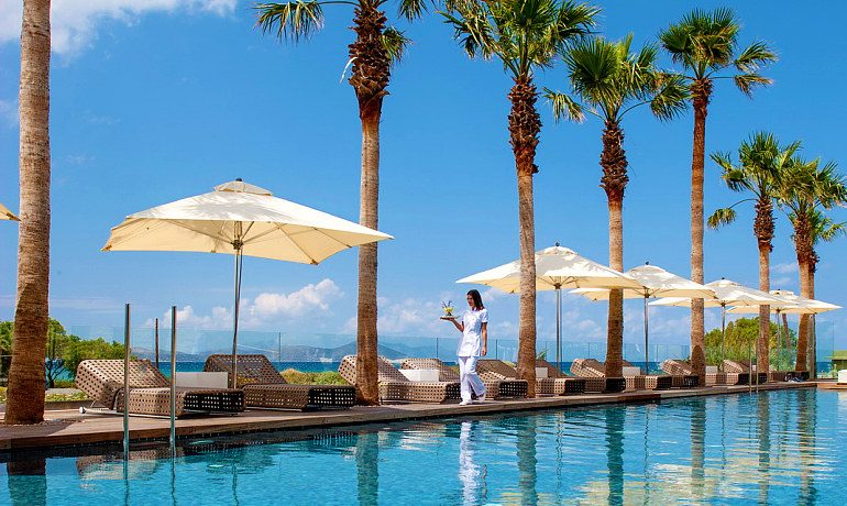 Aqua Blu Boutique Hotel & SPA outdoor pool with sunbeds