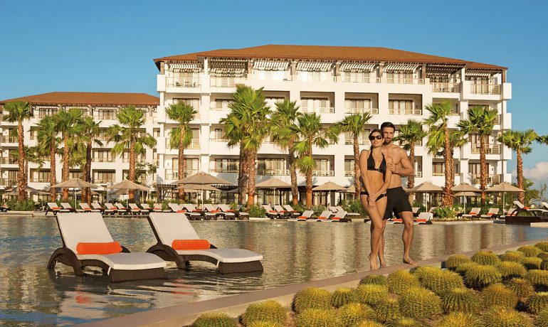 Secrets Playa Mujeres Golf & Spa Resort pool sunbeds